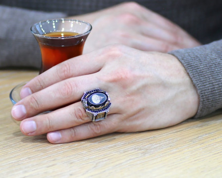 Men's ring, amber, in the state of the chair